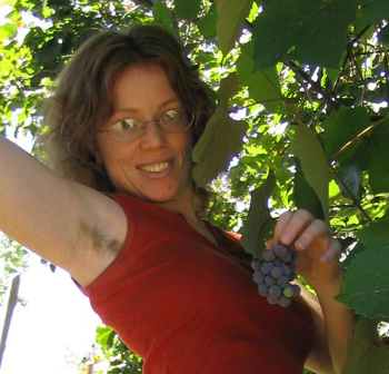 Fluffy Woman Picking Grapes